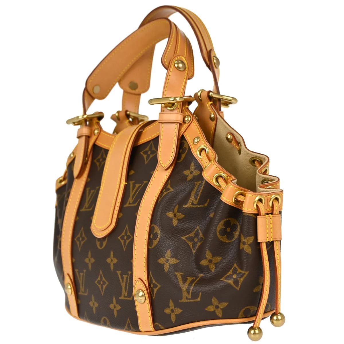 Brown monogram canvas handbag with tanned leather trim and a curved handle.