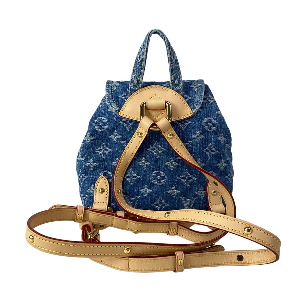 Denim backpack with woven monogram pattern, leather trim and two shoulder straps.