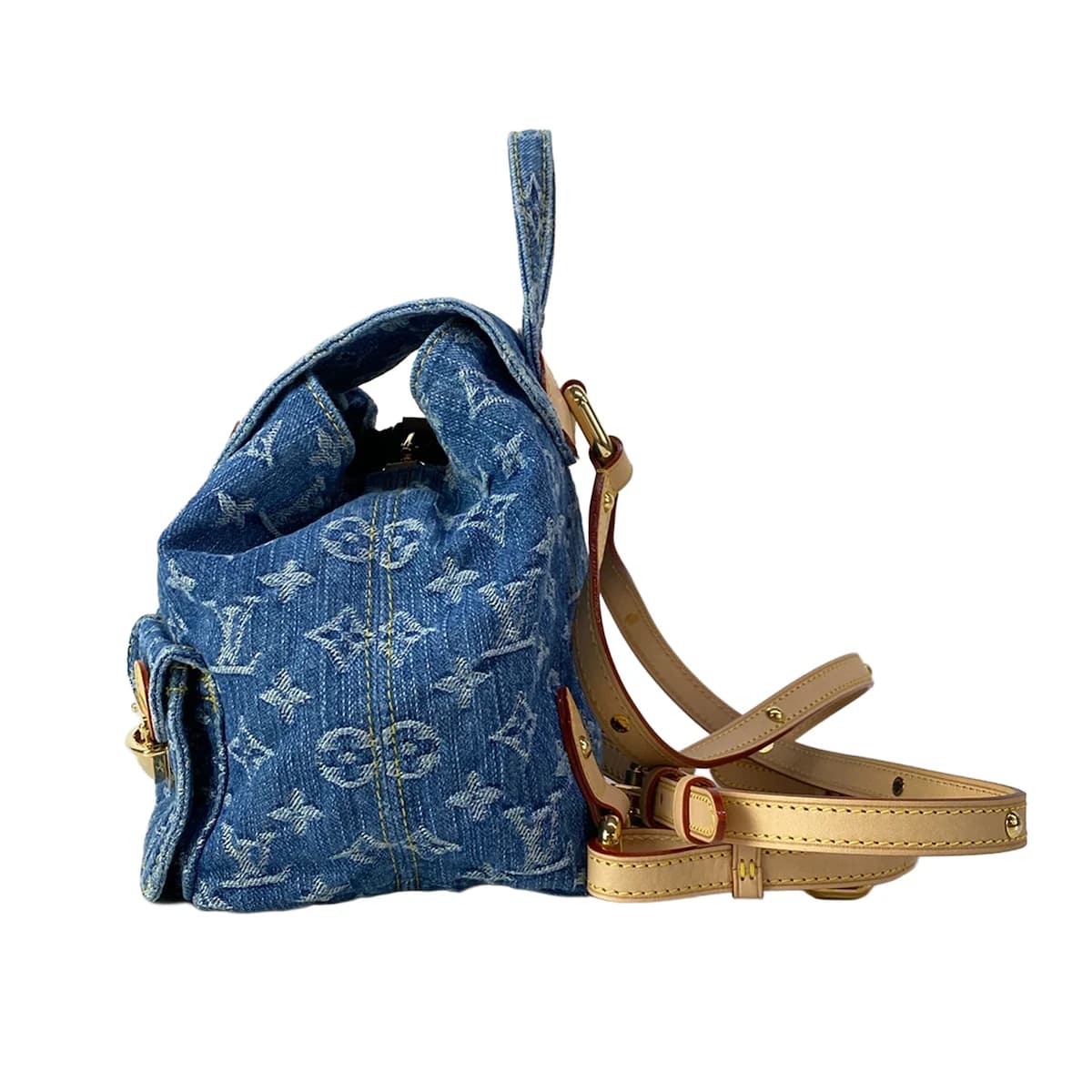 Denim backpack with woven monogram pattern, leather trim and two shoulder straps.