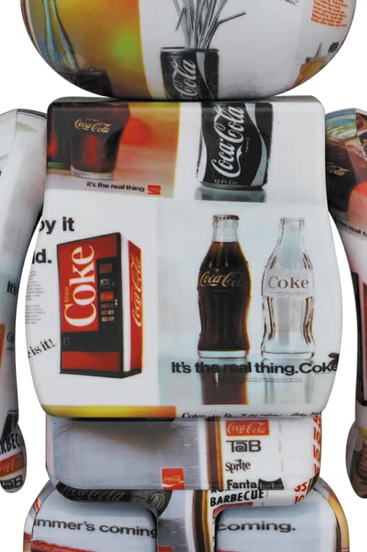 Large bear-shaped collectible figure in red and white soft-drink branding graphics