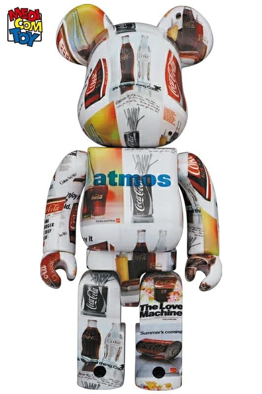 Large bear-shaped collectible figure in red and white soft-drink branding graphics