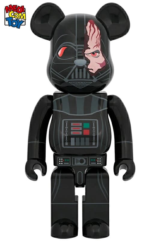 Large black bear-shaped collectible figure with a damaged helmet design and chest panel detail