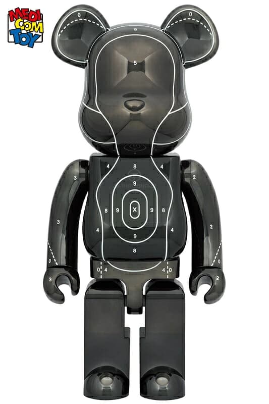 Large glossy bear-shaped figure with graphic print across the chest and arms.