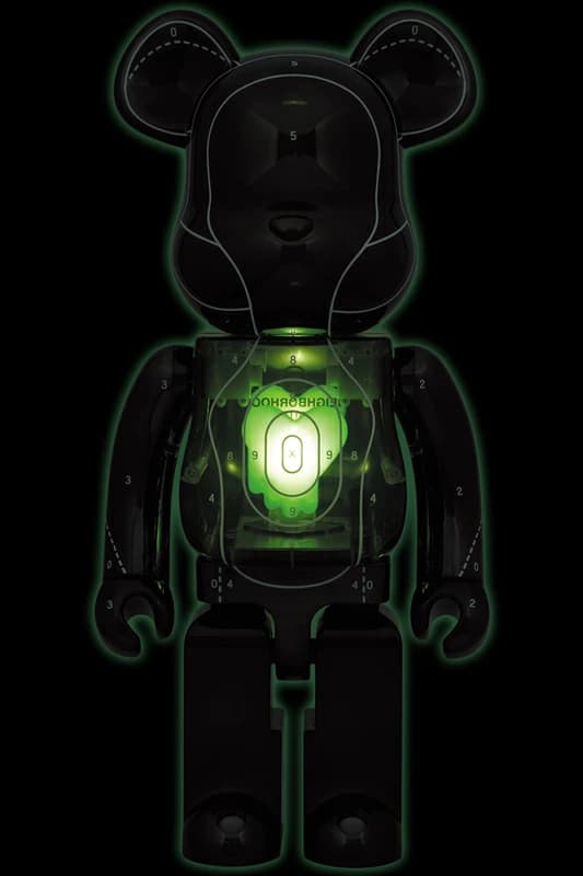 Large glossy bear-shaped figure with graphic print across the chest and arms.