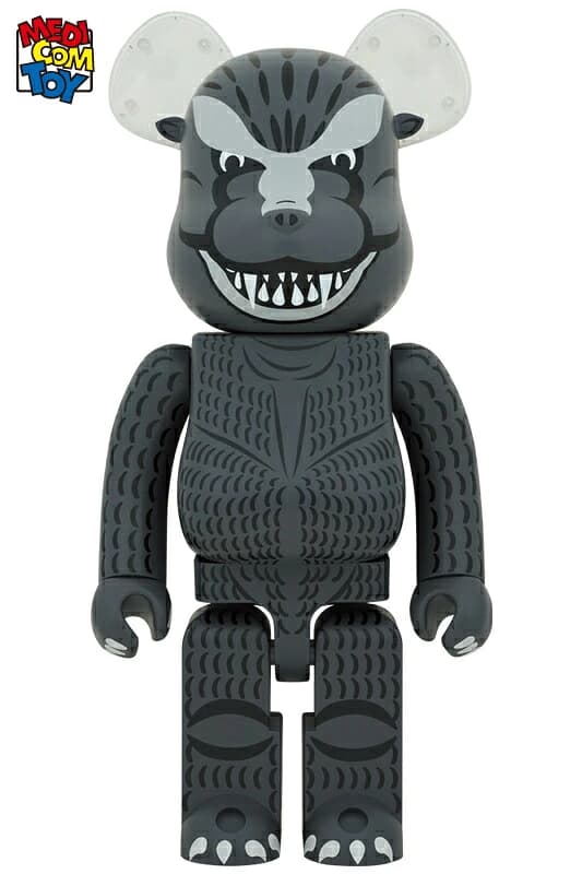 Large bear-shaped collectible figure decorated with dark scaled monster artwork.