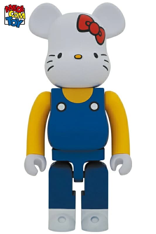 Large bear-shaped collectible figure decorated as a white cat character wearing blue overalls.