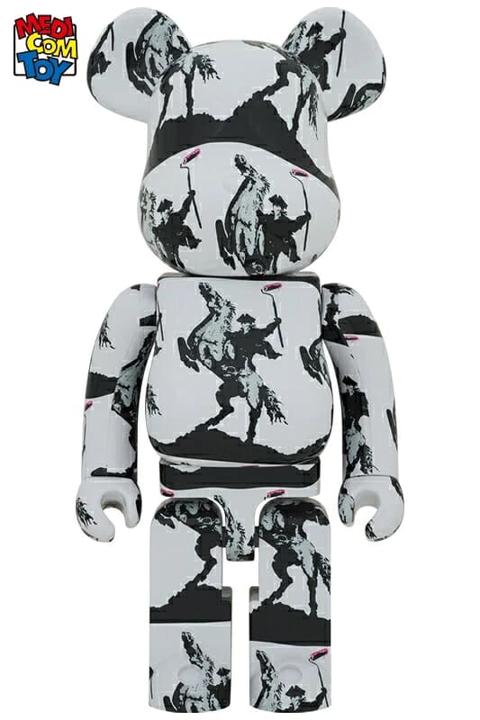 Large bear-shaped collectible figure with printed artwork across the torso and head