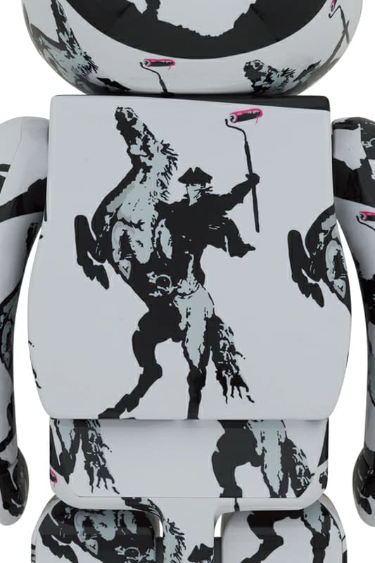 Large bear-shaped collectible figure with printed artwork across the torso and head