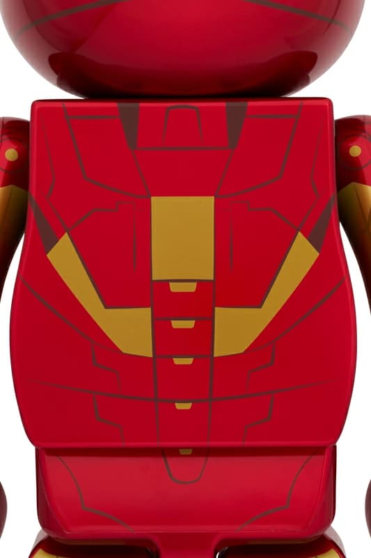 Large bear-shaped collectible figure in red and gold armoured superhero livery