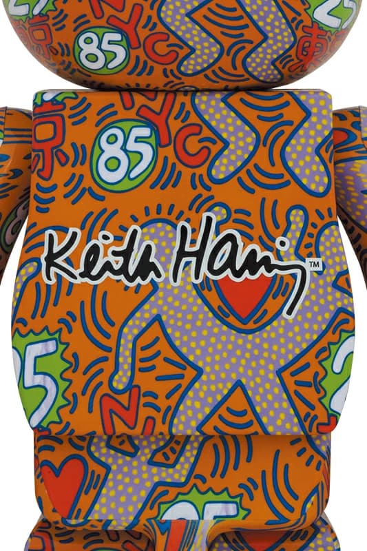 Large bear-shaped collectible figure covered in bold contemporary line-art figures