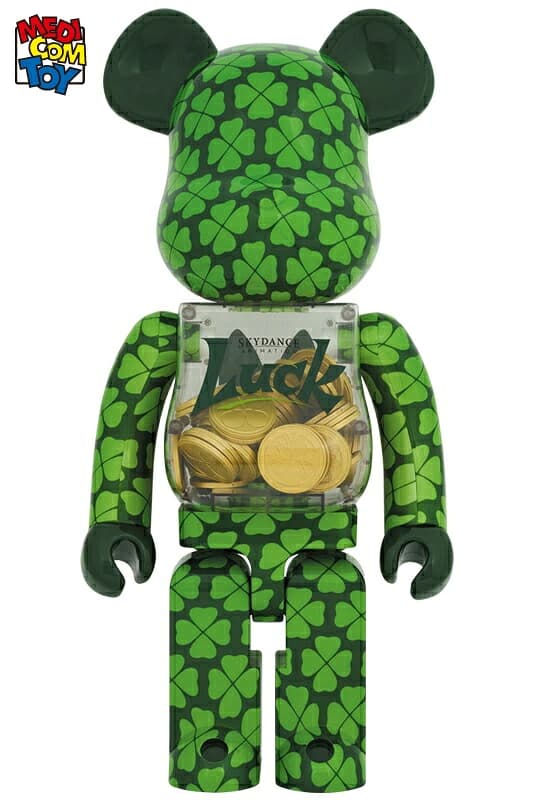 Large bear-shaped collectible figure standing upright with jointed arms and a rounded head.