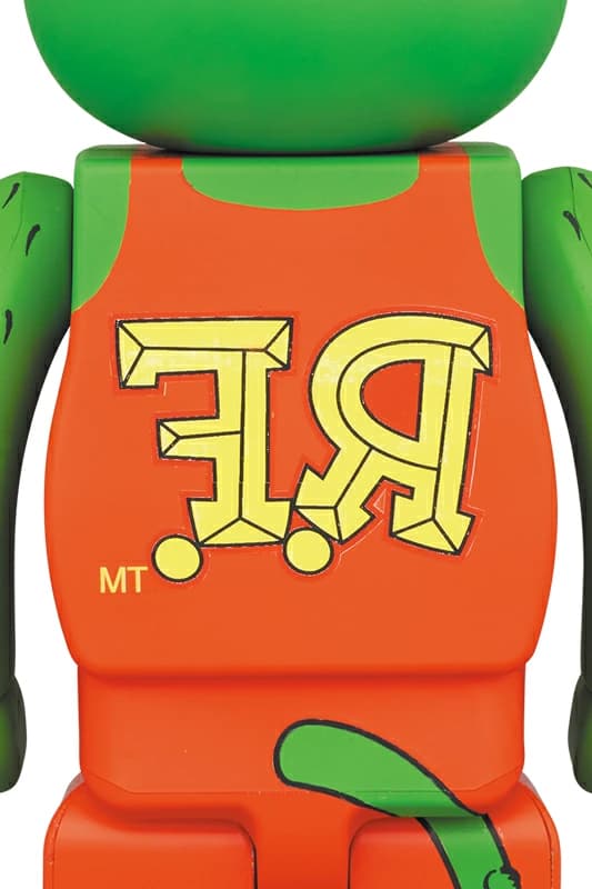 Large bear-shaped collectible figure with cartoon character artwork printed across the body