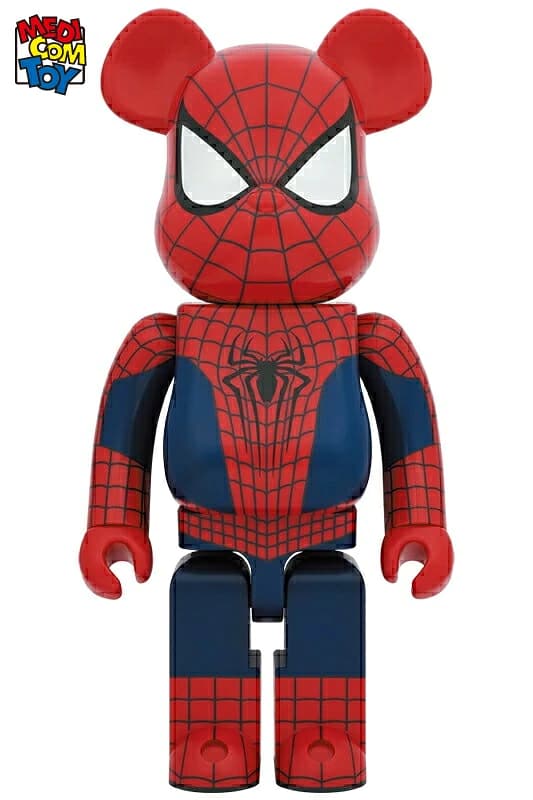 Large bear-shaped vinyl figure in red and blue with web pattern and masked eyes.