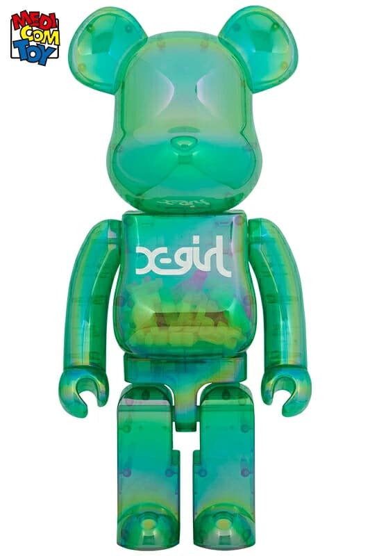 Standing bear-shaped collectible in translucent green plastic with printed logo lettering across the chest.