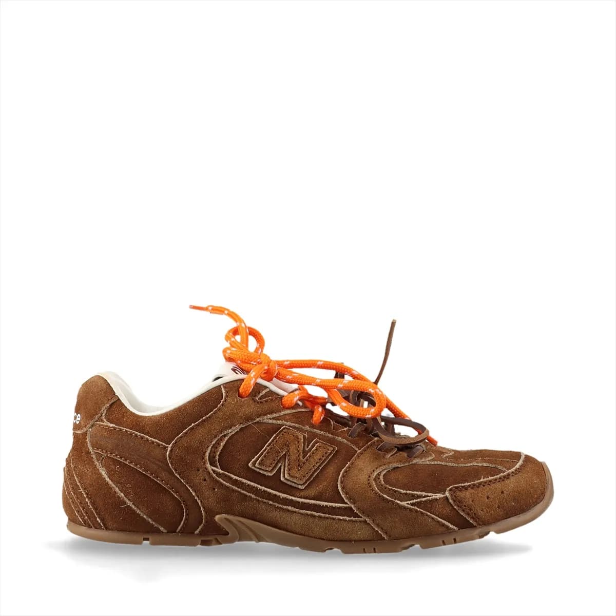 Brown suede low-top sneakers with a worn-look finish and pale gum-tone sole.