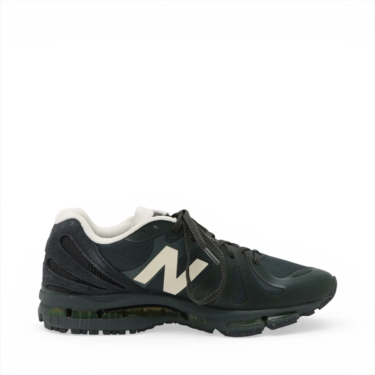Green low-profile sneakers photographed on a plain background.