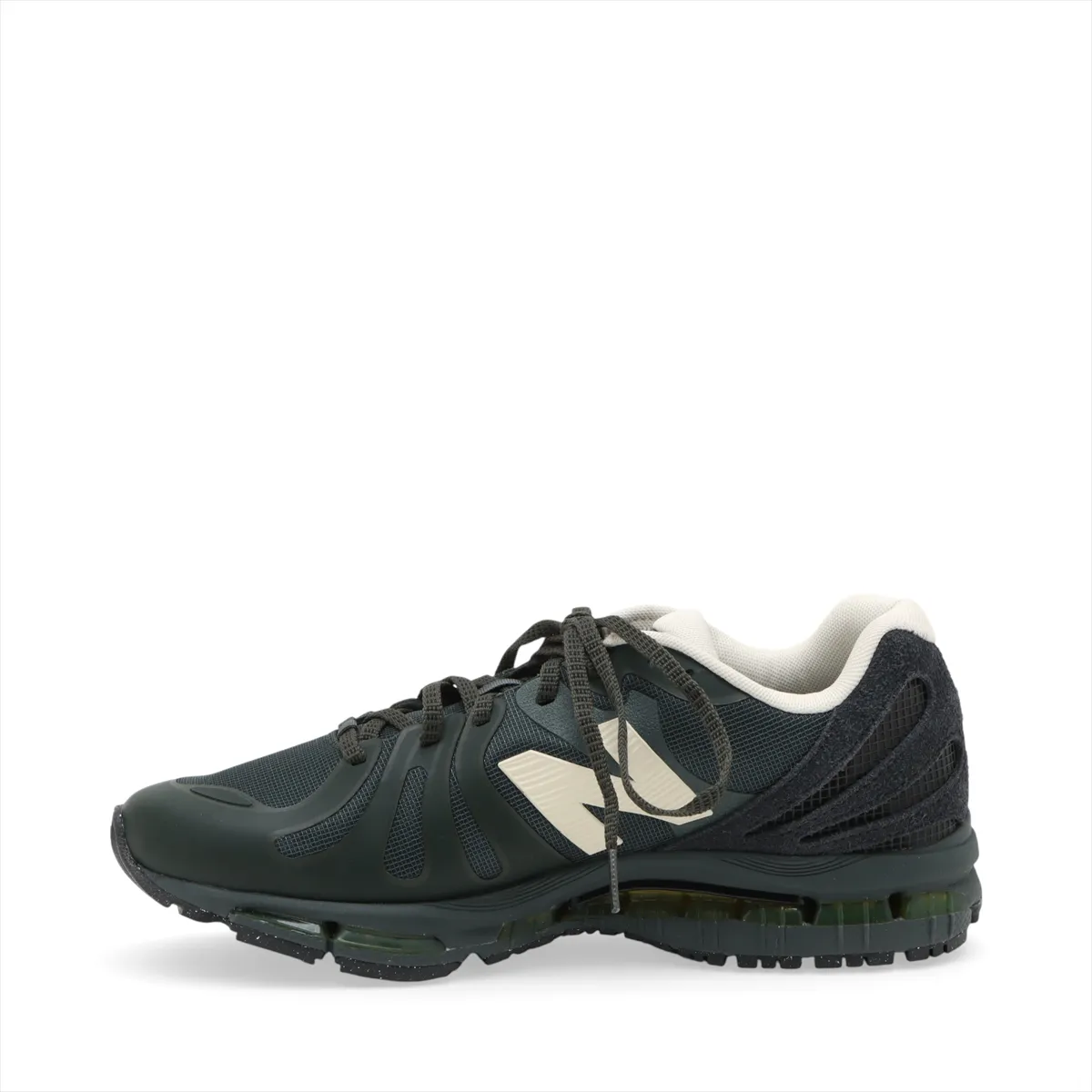 Green low-profile sneakers photographed on a plain background.