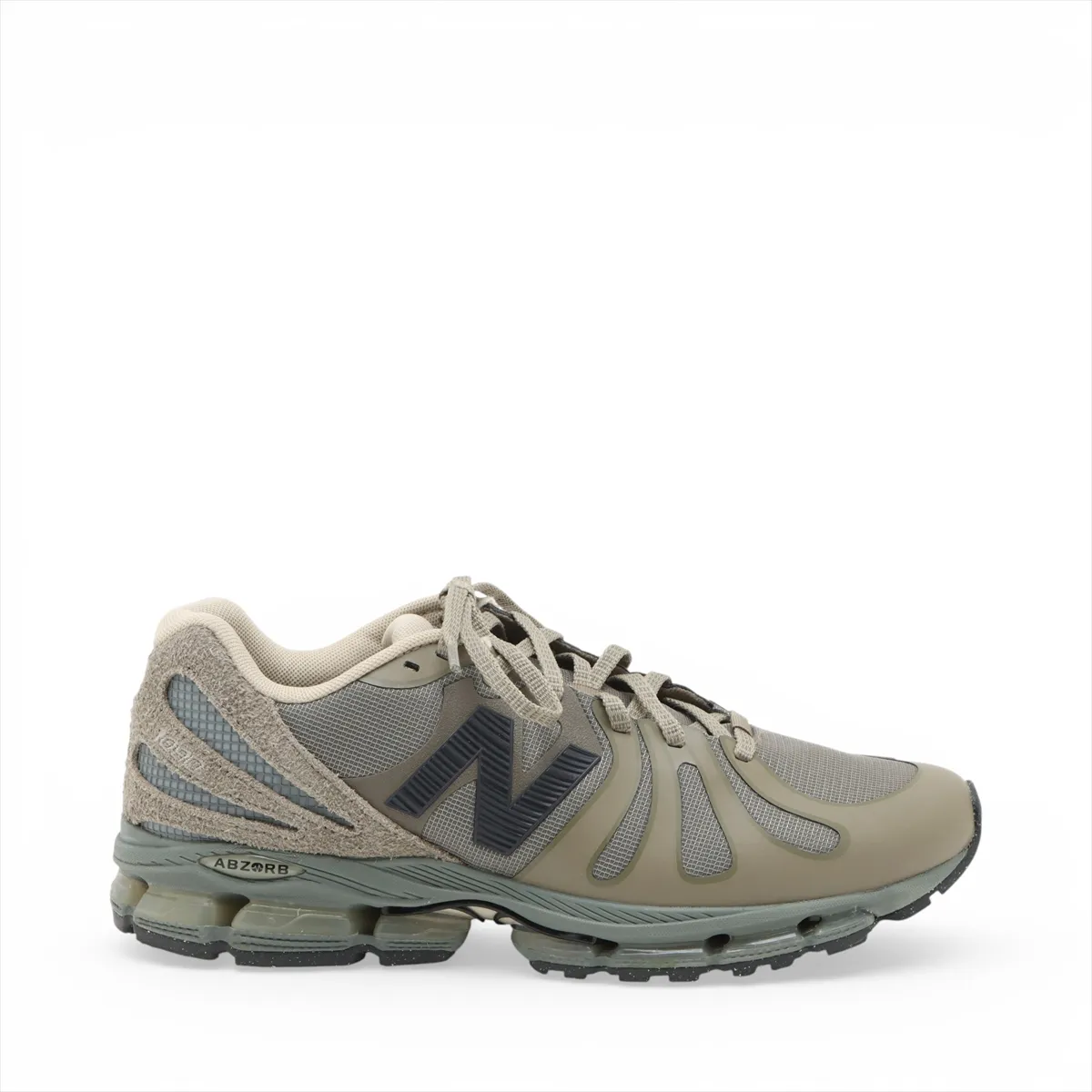 Khaki low-profile sneakers photographed on a plain background.