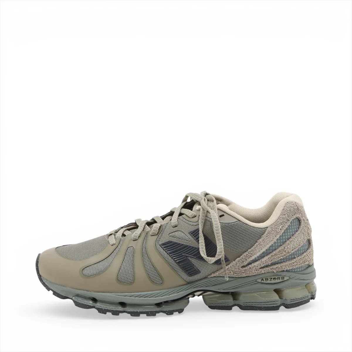 Khaki low-profile sneakers photographed on a plain background.