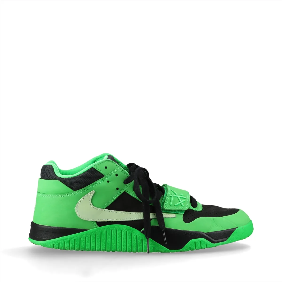 Black and green suede sneakers shown on a plain background.