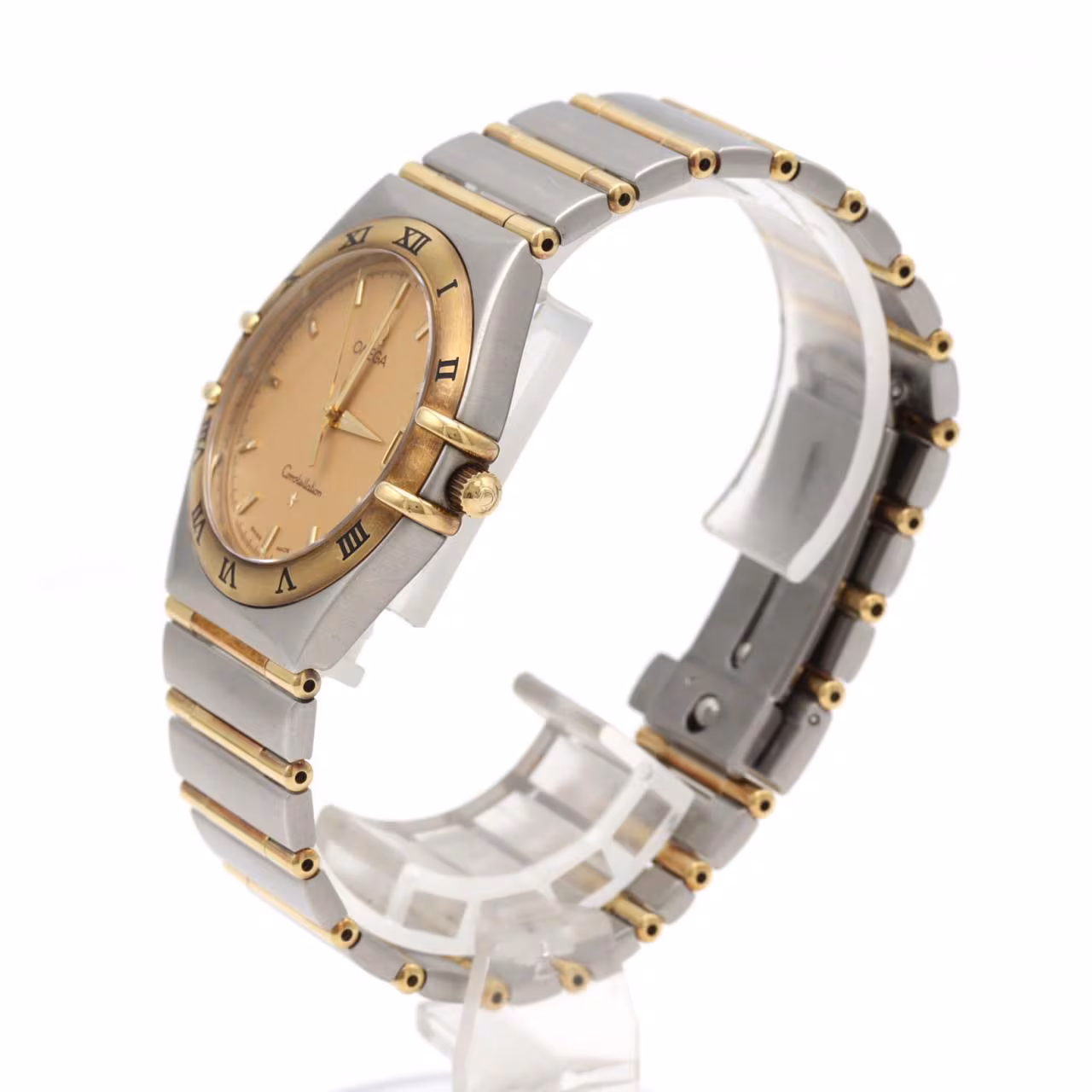 Two-tone silver and gold wristwatch with matching bracelet and a pale dial.