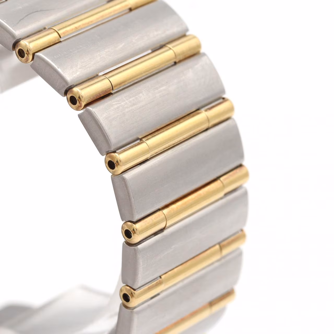 Two-tone silver and gold wristwatch with matching bracelet and a pale dial.