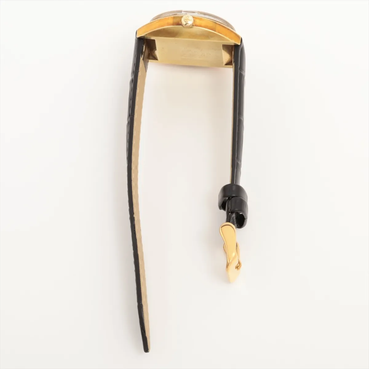 Vintage champagne-dial automatic watch in a gold-tone case on a strap, dial facing the camera
