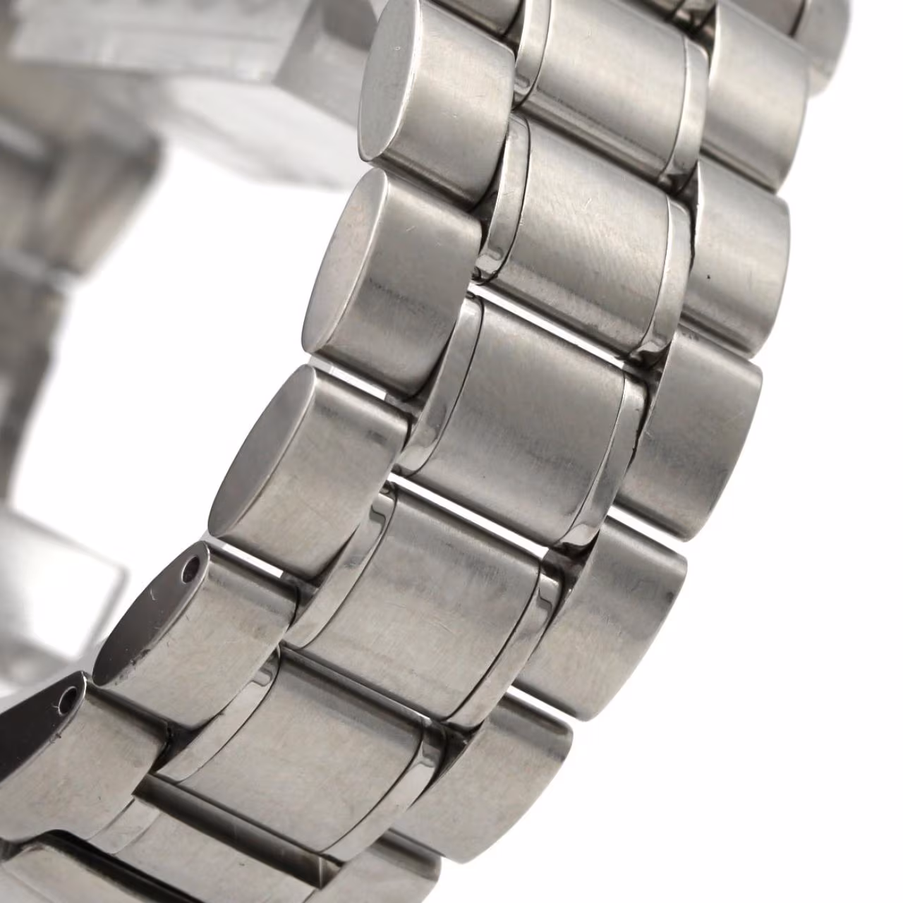 Steel diver-style wristwatch with a dark bezel and dial on a steel bracelet.