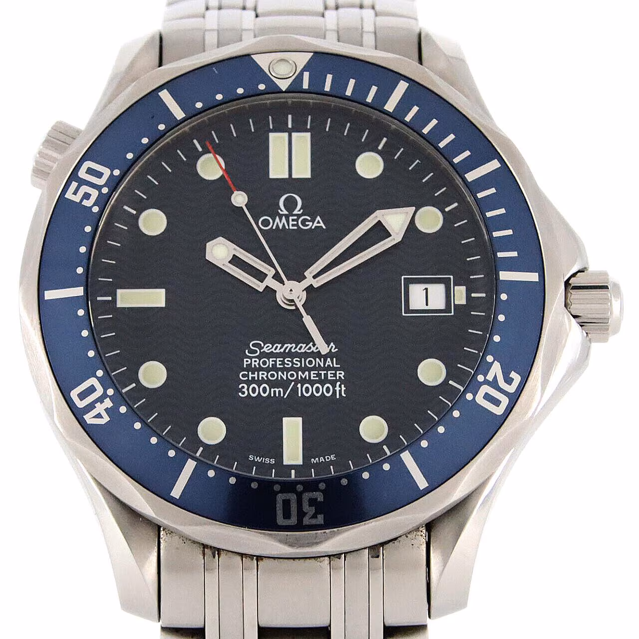 Steel diver's watch with blue wave-pattern dial, blue bezel and steel bracelet.