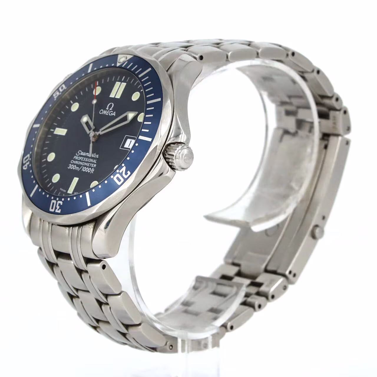 Steel diver's watch with blue wave-pattern dial, blue bezel and steel bracelet.