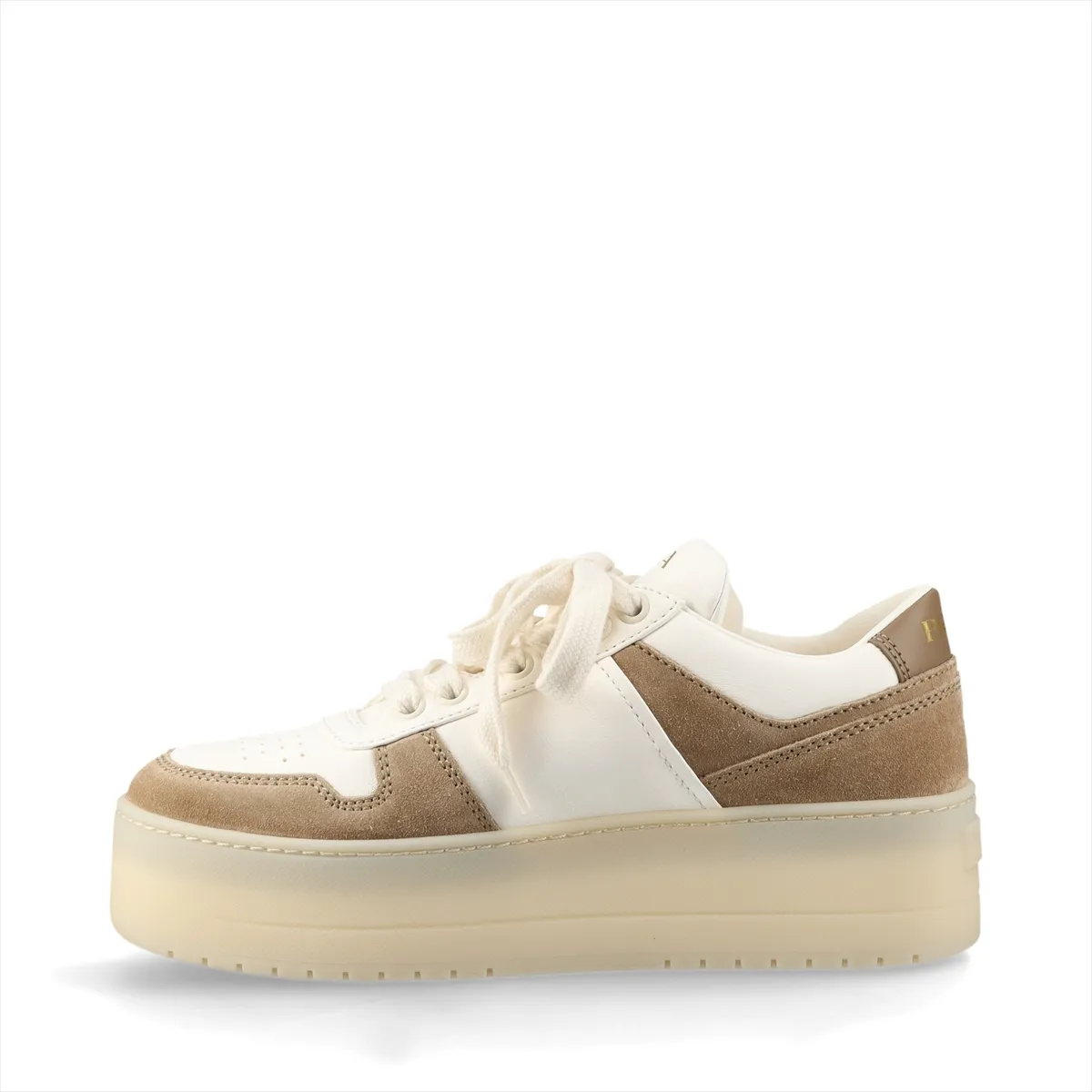 Thick-soled platform shoe in white and brown with a triangular metal logo plaque on the side.