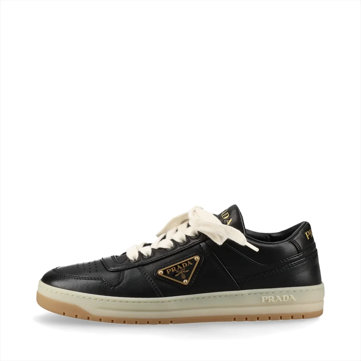 Black leather low-top sneakers with a metal triangle plaque on the side.