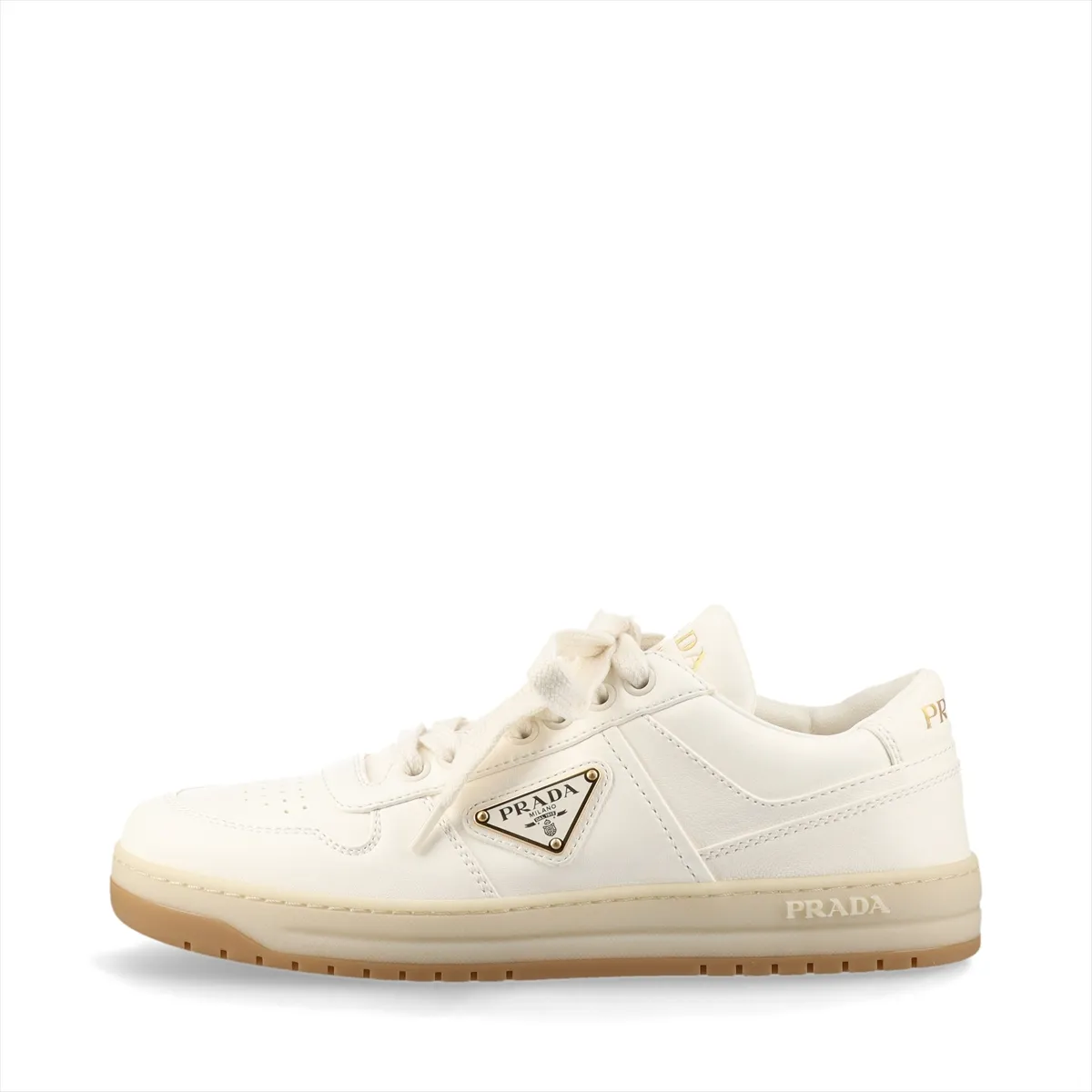 Ivory leather low-top trainers with a metal triangle plaque on the side.