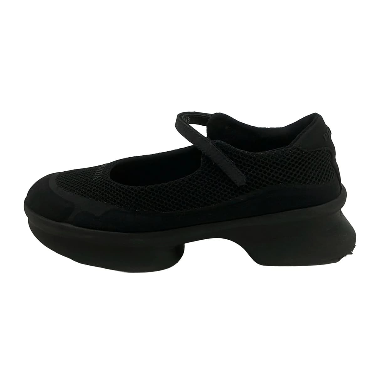 Black mesh low-top footwear, side view