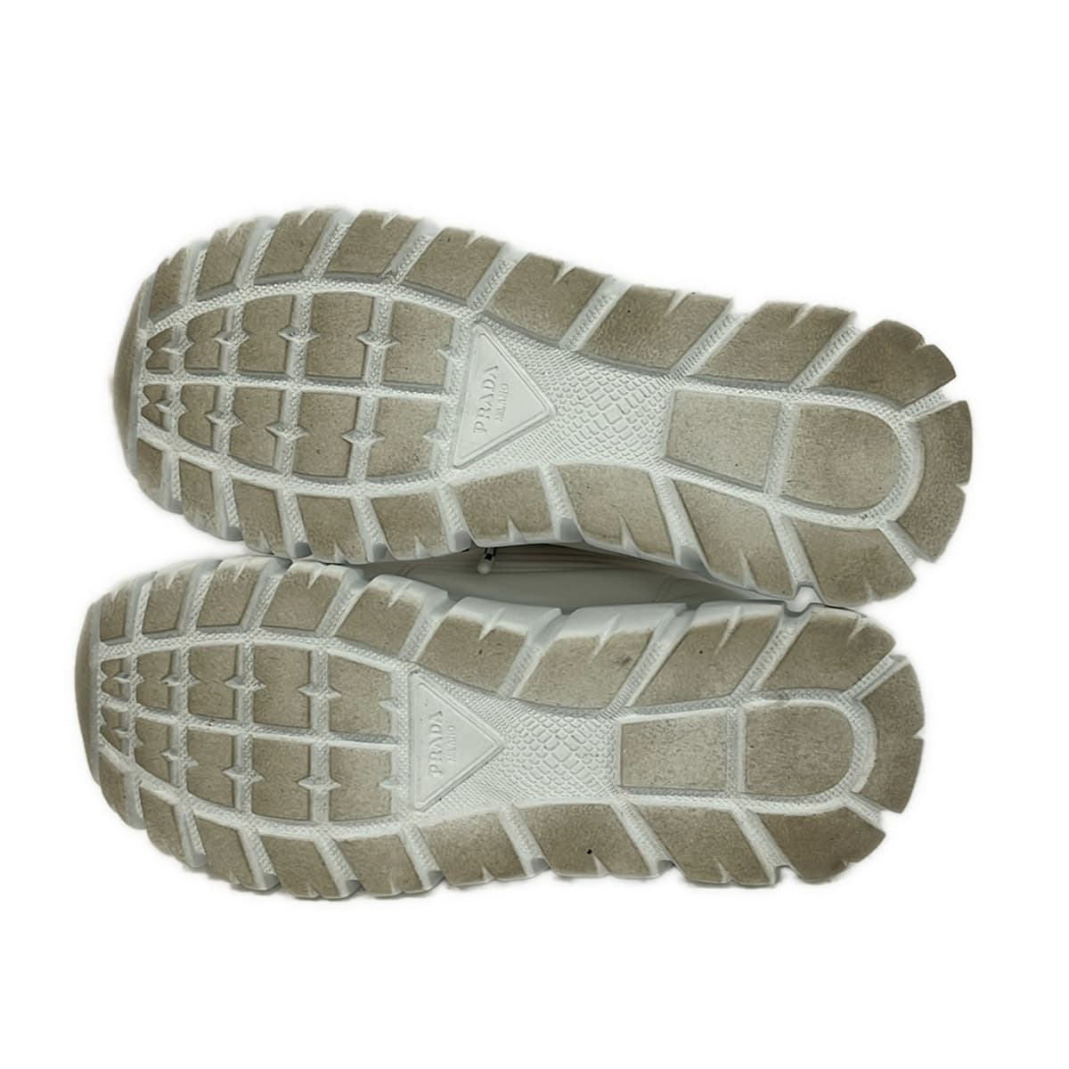 White and black low-top lace-up footwear, side view
