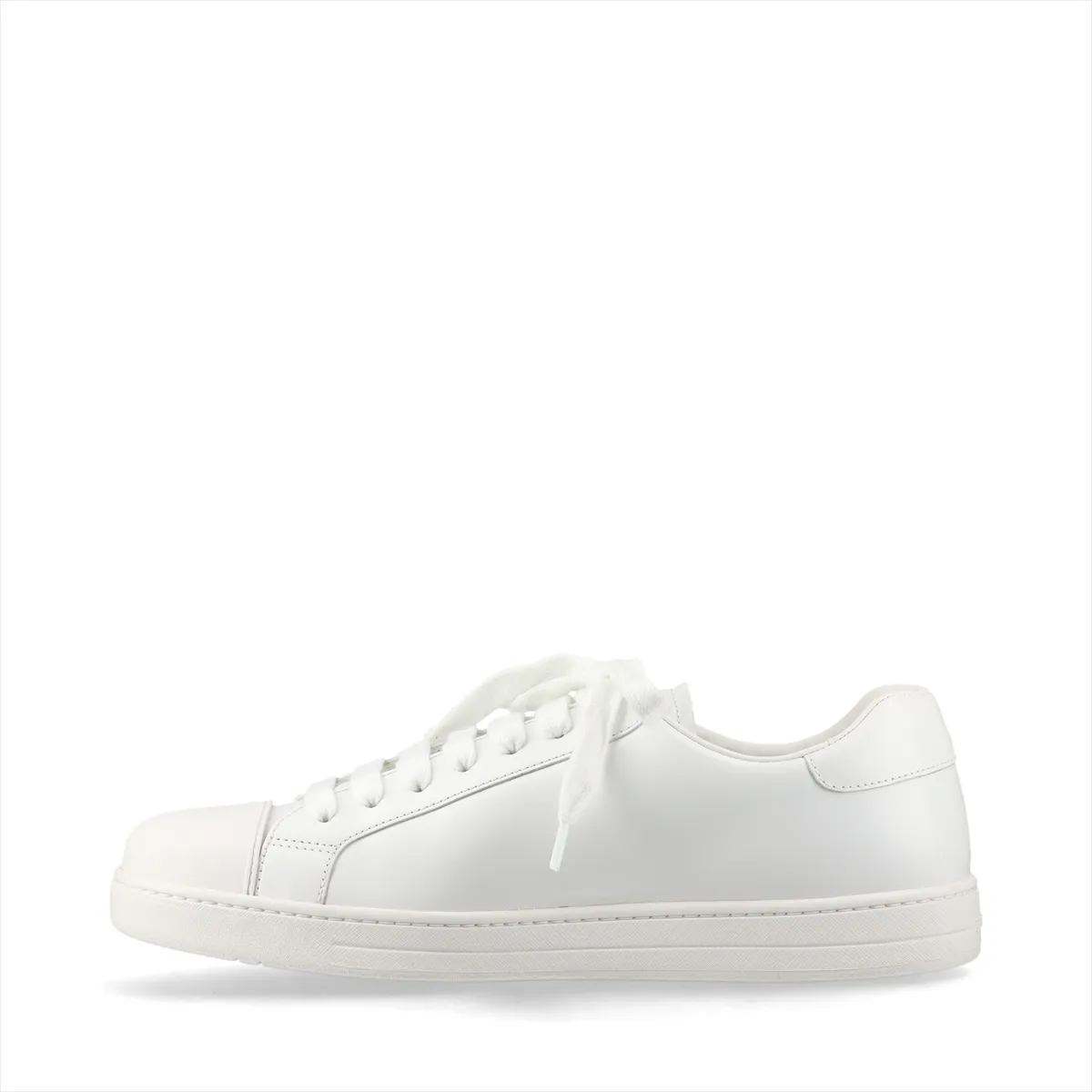 White low-top sneakers with red trim and a logo on the side panel.