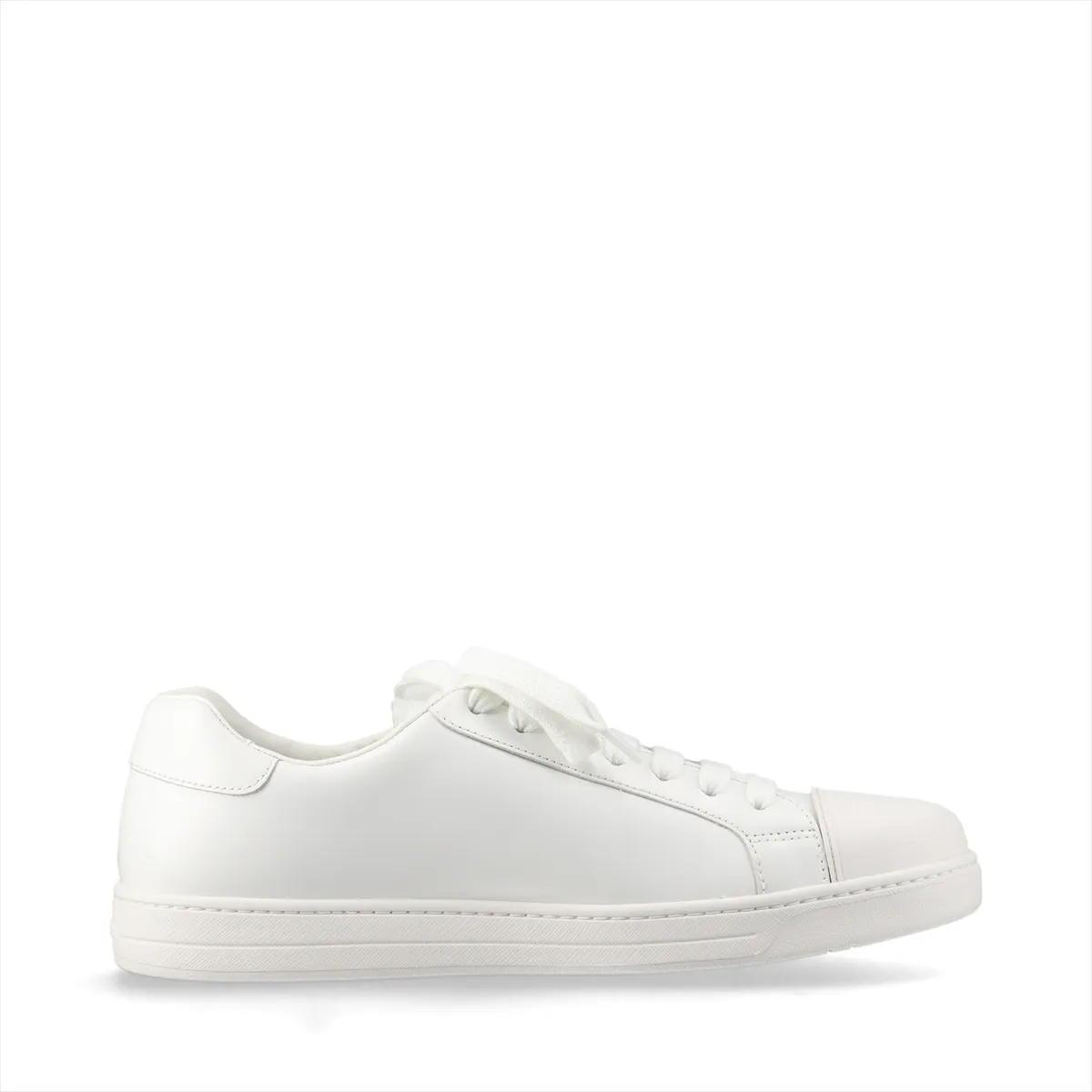 White low-top sneakers with red trim and a logo on the side panel.