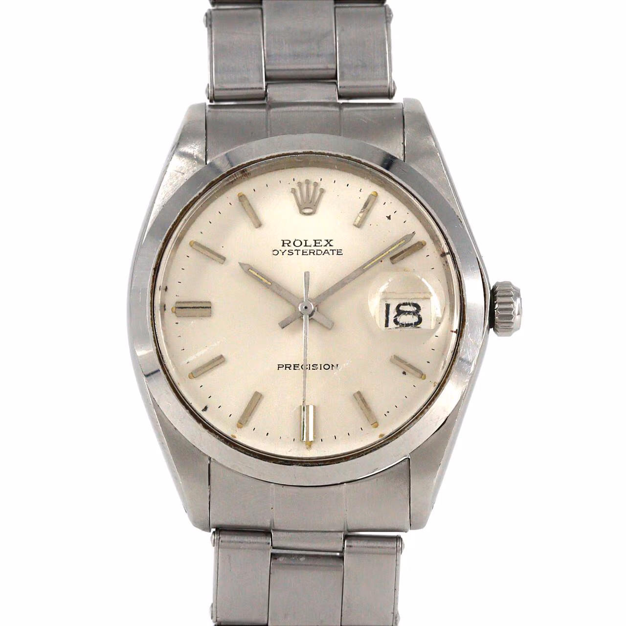 Steel manual-wind wristwatch with date window at three o'clock and steel bracelet.