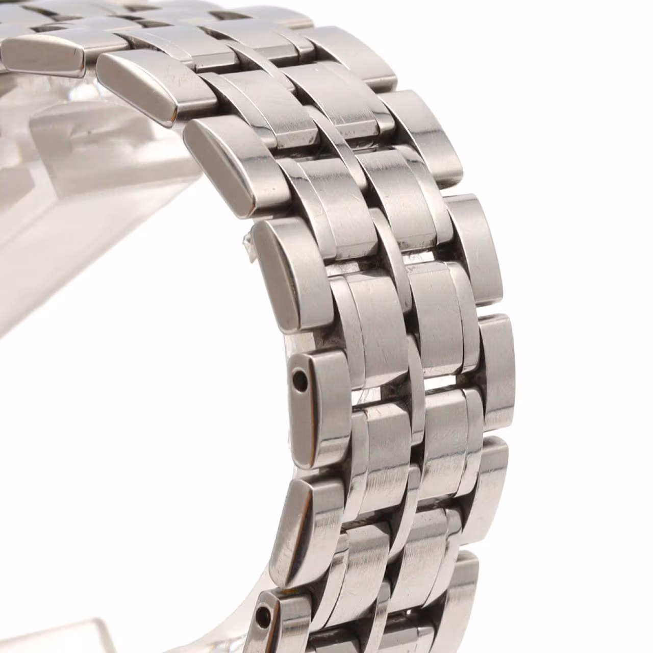 Stainless steel wristwatch with a plain dial, slim hands and steel bracelet.