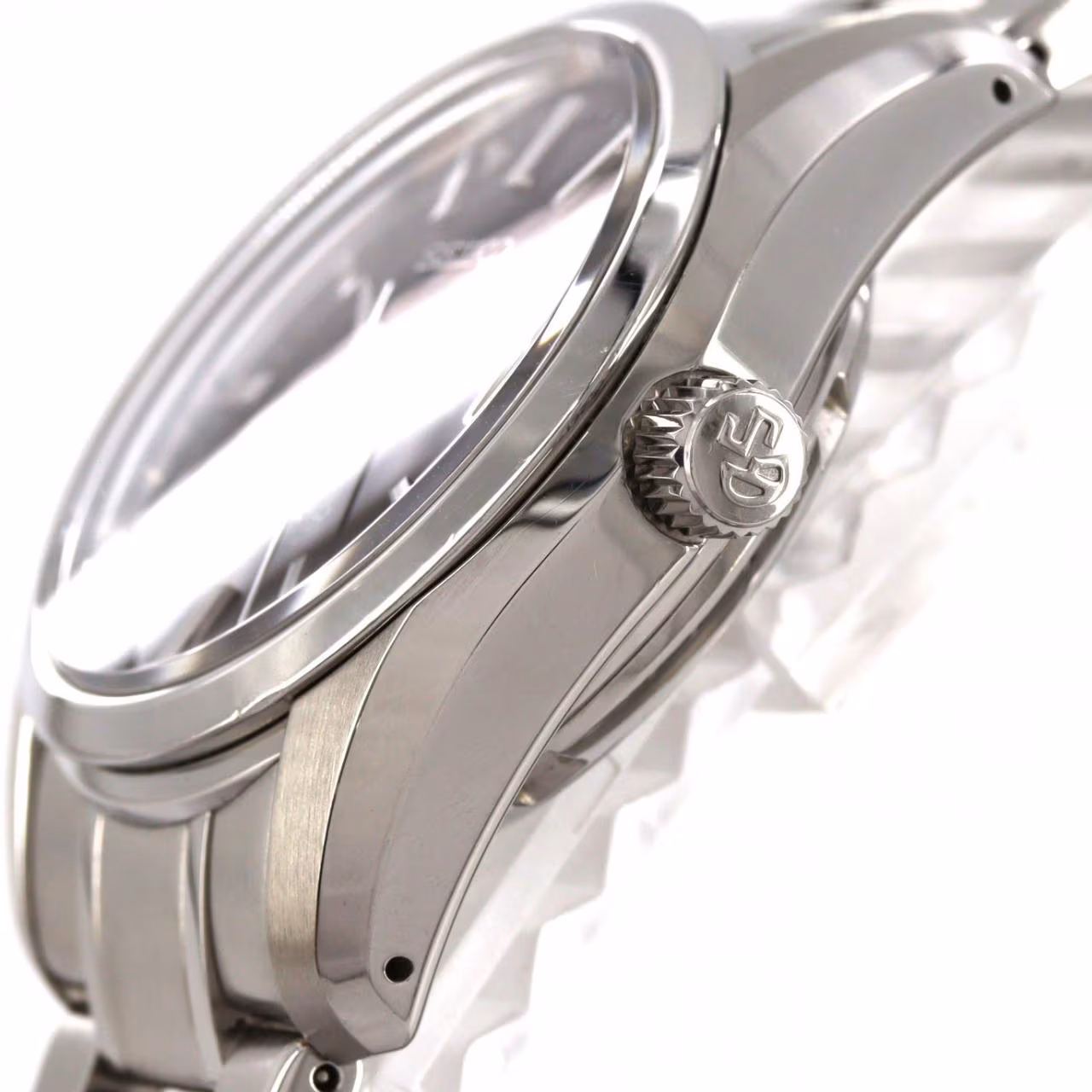 Stainless steel case and matching bracelet shown against a plain background.