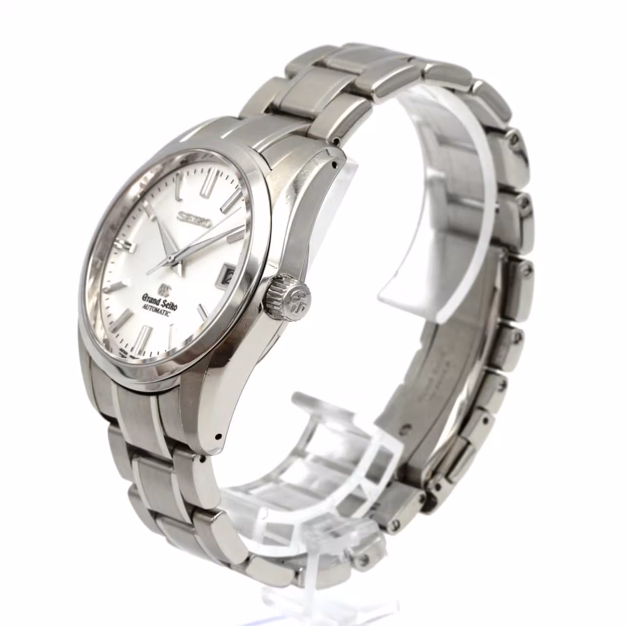 Stainless steel wristwatch with a light dial, baton hands and a matching bracelet.
