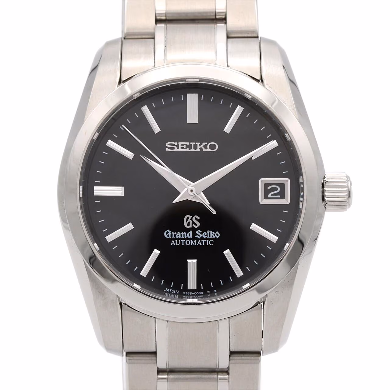 Stainless steel automatic wristwatch with a light dial, date window and a three-link bracelet.