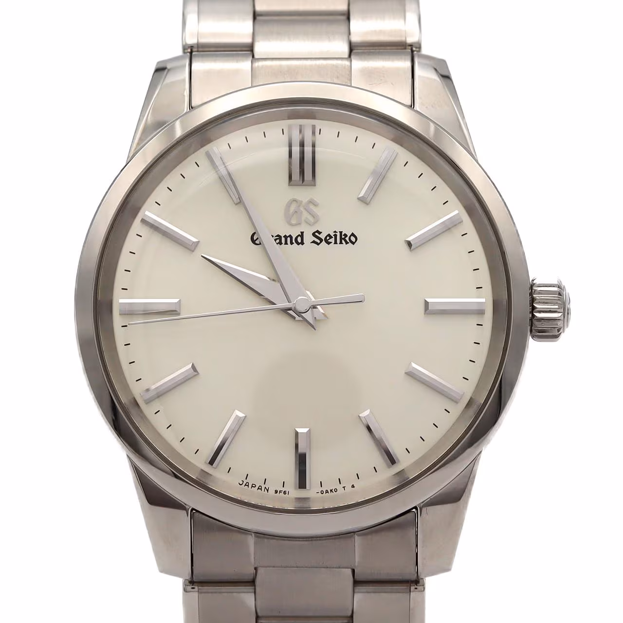 Stainless steel quartz wristwatch with a pale dial, slim baton markers and polished case.