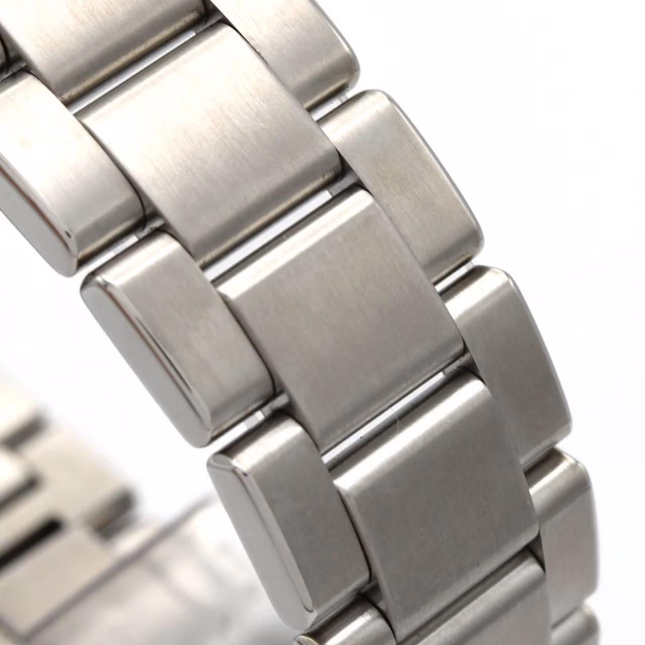 Stainless steel wristwatch with a light dial, baton markers and a matching steel bracelet.