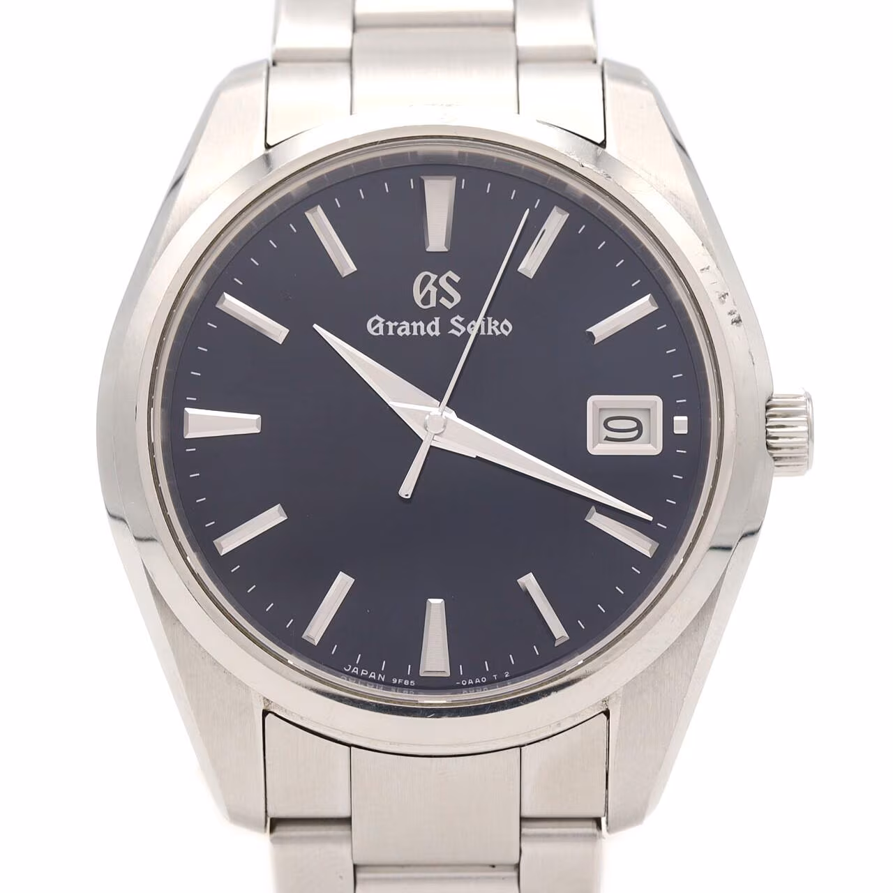 Stainless steel wristwatch with a light dial and matching bracelet.