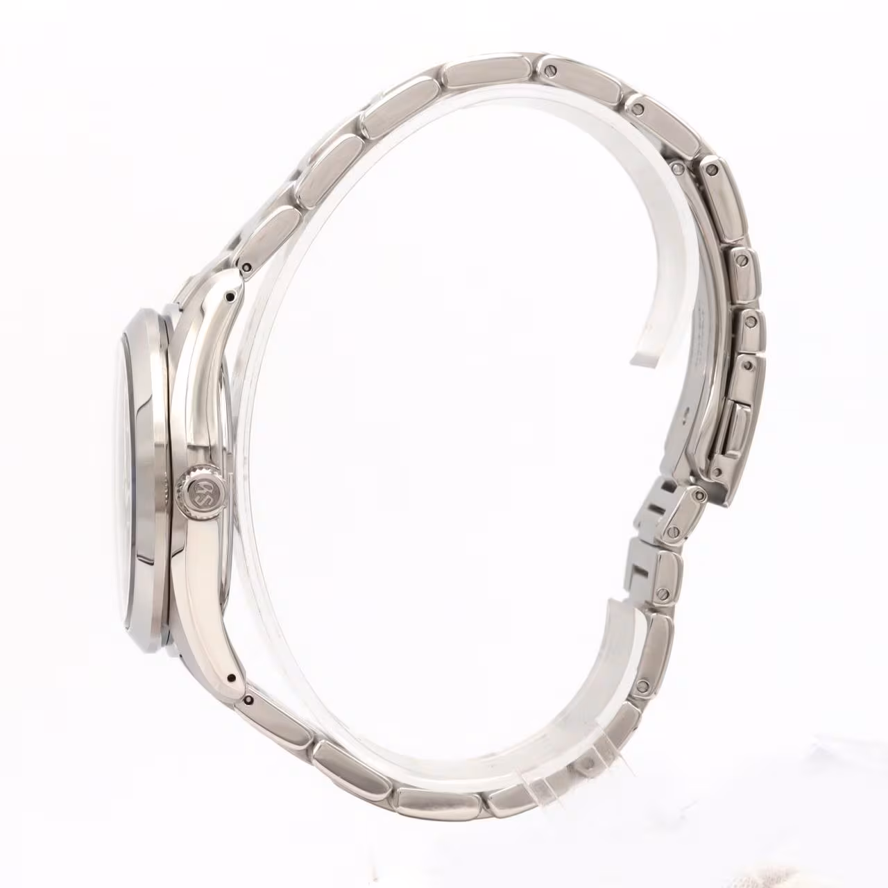 Stainless steel wristwatch with a blue GMT hand and date window on a steel bracelet.