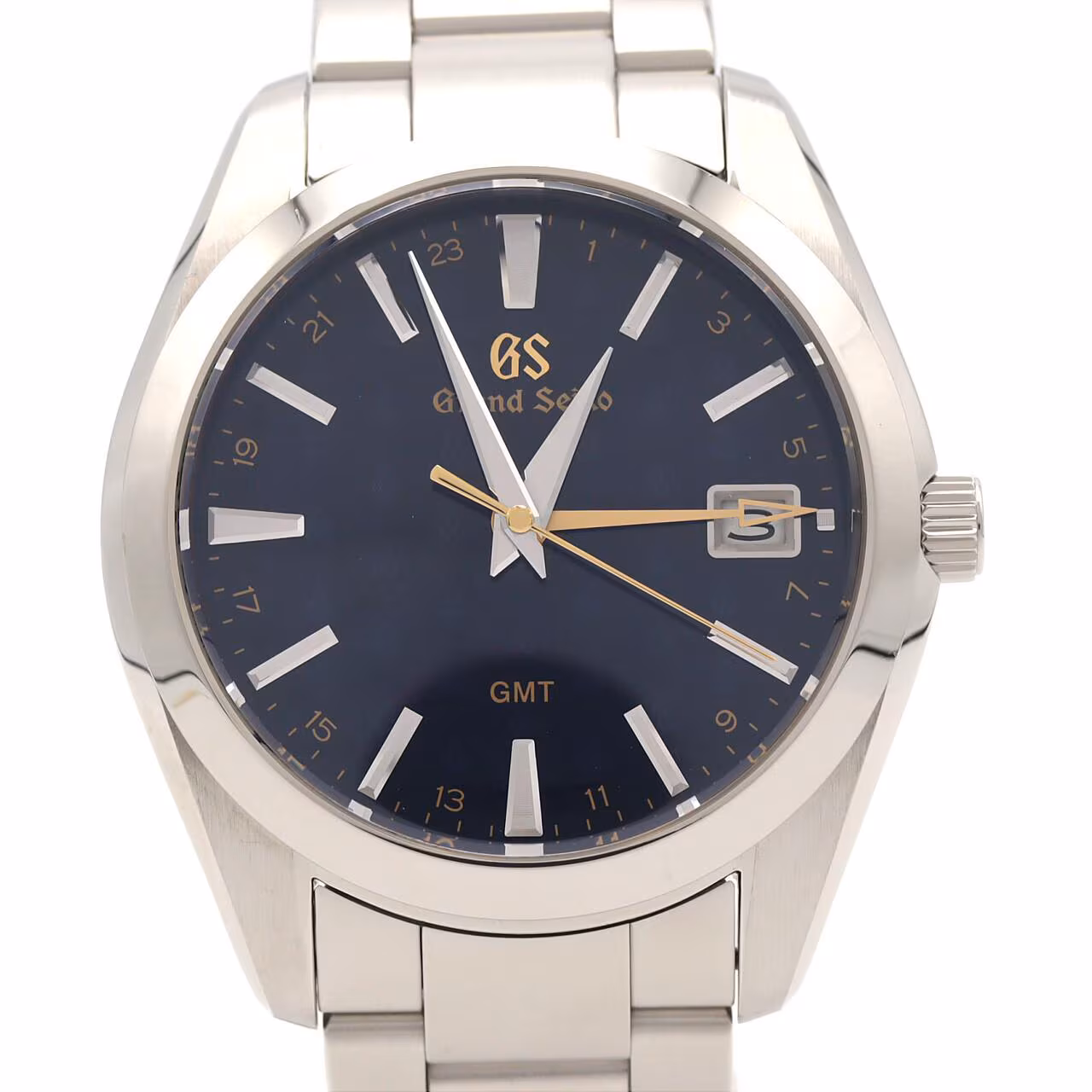 Stainless steel wristwatch with a blue GMT hand and date window on a steel bracelet.