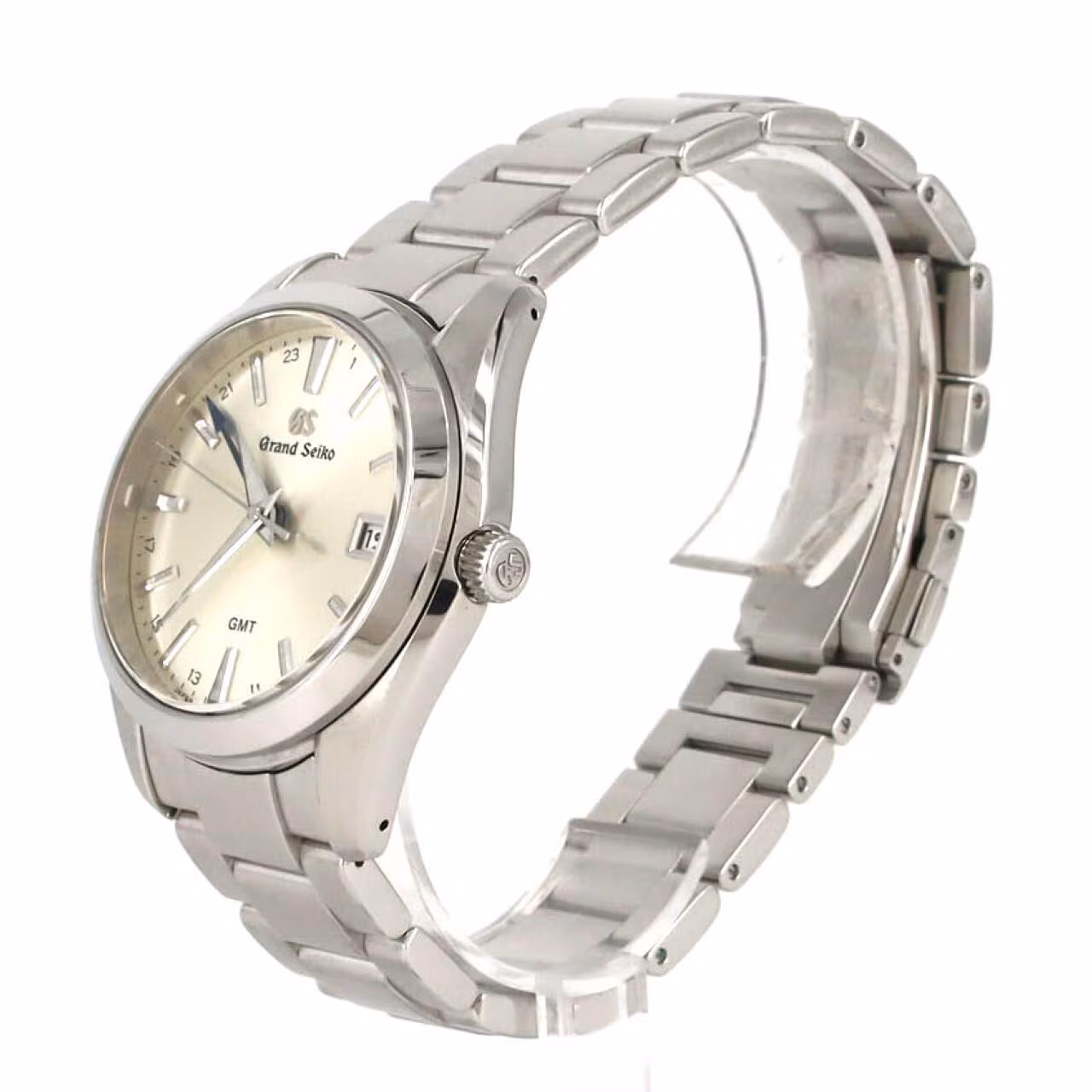 Stainless steel wristwatch with silver dial, blue-tipped GMT hand, date window and steel bracelet.