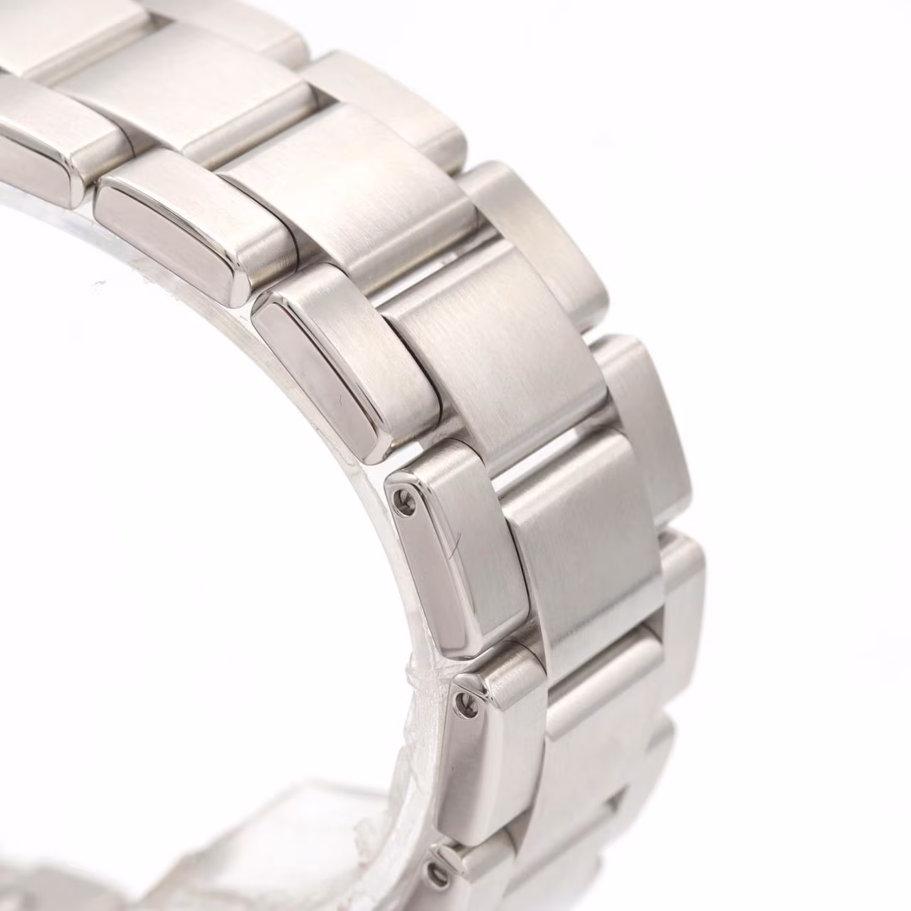 Stainless steel wristwatch with a white dial, applied markers and steel bracelet.