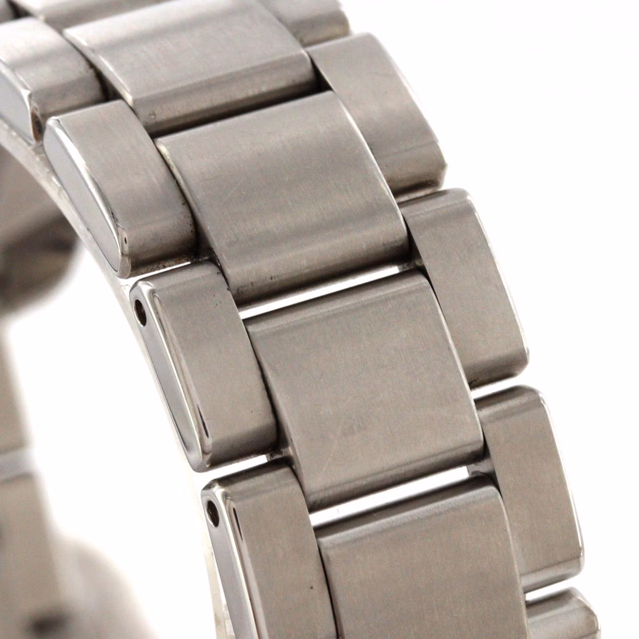 Stainless steel automatic wristwatch with a bracelet and a power reserve indicator on the dial.